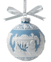 It's the night before Christmas and secretive Santa sneaks down the chimney in the finely embossed design of this Wedgwood ornament. In blue and white porcelain. It's the night before Christmas and secretive Santa sneaks down the chimney in the finely embossed design of this Wedgwood ornament. In blue and white porcelain.