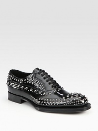 Studded lace-up design with exaggerated sole.Leather upperLeather liningWood/rubber soleMade in Italy Studded lace-up design with exaggerated sole.Leather upperLeather liningWood/rubber soleMade in Italy