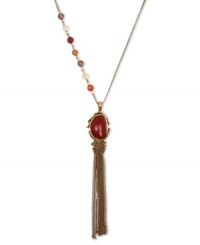 Addition by attraction. Crafted from gold tone base metal, Lucky Brand's pendant necklace features a semi-precious reconstituted calcite red stone at the center. Semi-precious carnelian, yellow jade, citrine and smokey quartz beads adorn the side. Approximate length: 23 inches + 2-inch extender. Approximate drop: 5 inches. Addition by attraction. Crafted from gold tone base metal, Lucky Brand's pendant necklace features a semi-precious reconstituted calcite red stone at the center. Semi-precious carnelian, yellow jade, citrine and smokey quartz beads adorn the side. Approximate length: 23 inches + 2-inch extender. Approximate drop: 5 inches.