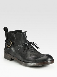 Expertly crafted in rich Italian leather, with lace-up and buckle detail, for a rugged, vintage appeal.Leather upperLeather liningPadded insoleLeather soleMade in Italy Expertly crafted in rich Italian leather, with lace-up and buckle detail, for a rugged, vintage appeal.Leather upperLeather liningPadded insoleLeather soleMade in Italy