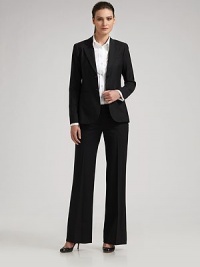 Luxe Italian wool with a flat front and flattering wide leg silhouette. Zip front Belt loops Side and back slash pockets Rise, about 8 Inseam, about 31 Virgin wool/lycra; dry clean Made in USA Luxe Italian wool with a flat front and flattering wide leg silhouette. Zip front Belt loops Side and back slash pockets Rise, about 8 Inseam, about 31 Virgin wool/lycra; dry clean Made in USA