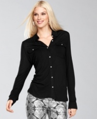 Sparkling rhinestone buttons make INC's knit shirt even more special. Sparkling rhinestone buttons make INC's knit shirt even more special.