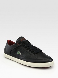 Sleek and modern design with perforated detail and contrast stitching, finished with embroidered logo on side panel.Leather upperPadded insoleRubber soleImported Sleek and modern design with perforated detail and contrast stitching, finished with embroidered logo on side panel.Leather upperPadded insoleRubber soleImported