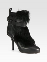 Lush kid shearling dresses up this strappy basic that easily transitions from day to night.Stacked heel, 4¼ (110mm)Hidden platform, ½ (15mm)Compares to a 3¾ heel (95mm)Leather upperKid shearling-trim on the frontLeather wrap-around strap with metal pull-tabLeather lining and solePadded insoleMade in ItalyThis style runs true to size. We recommend ordering your usual size for a standard fit. Lush kid shearling dresses up this strappy basic that easily transitions from day to night.Stacked heel, 4¼ (110mm)Hidden platform, ½ (15mm)Compares to a 3¾ heel (95mm)Leather upperKid shearling-trim on the frontLeather wrap-around strap with metal pull-tabLeather lining and solePadded insoleMade in ItalyThis style runs true to size. We recommend ordering your usual size for a standard fit.