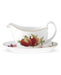 Ripe peaches and sweet summer berries enhance the Evesham gravy boat and stand, crafted of pristine porcelain with lustrous gold banding by Royal Worcester. Ripe peaches and sweet summer berries enhance the Evesham gravy boat and stand, crafted of pristine porcelain with lustrous gold banding by Royal Worcester.