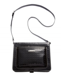 Glam up your gadget with signature style with this super shiny iPad case from Nine West. Featuring a logo-embossed pattern with the iconic 9 monogram, the convenient crossbody strap adds on-the-go ease. Glam up your gadget with signature style with this super shiny iPad case from Nine West. Featuring a logo-embossed pattern with the iconic 9 monogram, the convenient crossbody strap adds on-the-go ease.
