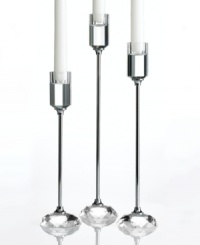 Cool metal meets dazzling crystal for candlesticks with a thoroughly modern edge. In three sizes for eye-catching elegance, it's a chic set for the bride-to-be. Cool metal meets dazzling crystal for candlesticks with a thoroughly modern edge. In three sizes for eye-catching elegance, it's a chic set for the bride-to-be.
