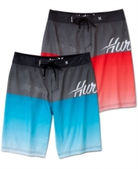 Notice how the best board shorts now have a dark, off-center edge. Case in point: Hurley Split two-tone trunks with large side logo.