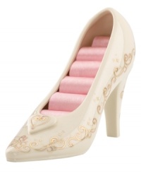 It fits! Like her sparkling glass slipper, this Disney ring holder evokes all the romance and splendor of Cinderella's night at the ball. Hearts, swirls and stars twinkle in gold from heel to toe, while pretty pink satin lines the interior. It fits! Like her sparkling glass slipper, this Disney ring holder evokes all the romance and splendor of Cinderella's night at the ball. Hearts, swirls and stars twinkle in gold from heel to toe, while pretty pink satin lines the interior.