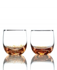 Fire up the casual table with this set of drinking glasses from Denby. Simply shaped and speckled red, orange and yellow, these small glass tumblers spark drama in modern spaces. Pair with Fire dinnerware, also by Denby. Fire up the casual table with this set of drinking glasses from Denby. Simply shaped and speckled red, orange and yellow, these small glass tumblers spark drama in modern spaces. Pair with Fire dinnerware, also by Denby.