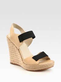 Comfy-chic espadrille wedge accompanied by soft leather straps and contrasting elastic trim. Braided hemp wedge, 4 (100mm)Braided hemp platform, 1 (25mm)Compares to a 3 heel (75mm)Elastic and leather upperLeather lining and solePadded insoleImported Comfy-chic espadrille wedge accompanied by soft leather straps and contrasting elastic trim. Braided hemp wedge, 4 (100mm)Braided hemp platform, 1 (25mm)Compares to a 3 heel (75mm)Elastic and leather upperLeather lining and solePadded insoleImported