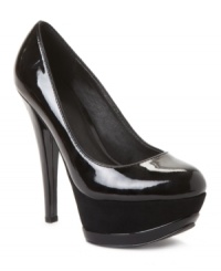 Hot, hot, hot! Make a dramatic entrance wherever you go in Kelsi Dagger's patent leather Lorelle platform pumps. With an exaggerated suede covered platform and 5-1/2 heel, they're available in bright red, black and sand. Hot, hot, hot! Make a dramatic entrance wherever you go in Kelsi Dagger's patent leather Lorelle platform pumps. With an exaggerated suede covered platform and 5-1/2 heel, they're available in bright red, black and sand.