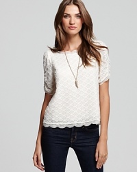 Fall signals our quest for simple elegance--this sublime lace Joie top boasts a richly-textured diamond pattern with flattering ruched sleeves for the look we desire. Fall signals our quest for simple elegance--this sublime lace Joie top boasts a richly-textured diamond pattern with flattering ruched sleeves for the look we desire.
