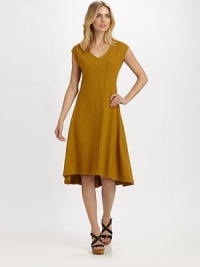 A casual dress that also scores major points in the style category, thanks to its unique wrap-inspired front.V-neckCap sleevesHi-lo hemEasy fitAbout 30 from natural waist55% hemp/45% organic cottonMachine washImported A casual dress that also scores major points in the style category, thanks to its unique wrap-inspired front.V-neckCap sleevesHi-lo hemEasy fitAbout 30 from natural waist55% hemp/45% organic cottonMachine washImported