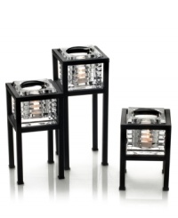 Inspired by a city that never turns out the lights, Manhattan candle holders set your home aglow with chic sophistication. Sleek metal meets ribbed glass at sharp angles for towers of dazzling shine. Inspired by a city that never turns out the lights, Manhattan candle holders set your home aglow with chic sophistication. Sleek metal meets ribbed glass at sharp angles for towers of dazzling shine.