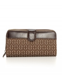 Get a hold of this: the elegant Annabelle clutch brings polish to your day with a signature logo weave and patent trim, and it's loaded with interior features to keep you organized. Get a hold of this: the elegant Annabelle clutch brings polish to your day with a signature logo weave and patent trim, and it's loaded with interior features to keep you organized.