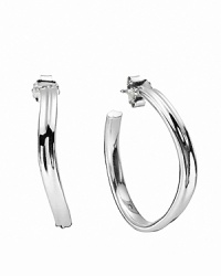 Effortless elegance evolves from natural lines in PANDORA's small hoop earrings in shiny sterling silver. Effortless elegance evolves from natural lines in PANDORA's small hoop earrings in shiny sterling silver.