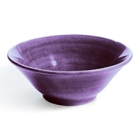 Uniquely crafted to seamlessly join modern design with functionality, this flower-inspired ceramic bowl from Mateus is casually chic.