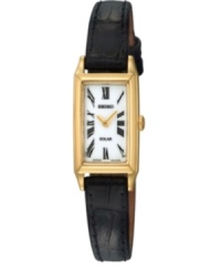 Bring refinement to everyday with the slim lines of this solar-powered dress watch by Seiko. Black croc-emobssed leather strap and rectangular gold tone stainless steel case, 16mm. White dial features black Roman numerals, two gold tone hands and logo. Solar-powered quartz movement. Water resistant to 30 meters. Three-year limited warranty. Bring refinement to everyday with the slim lines of this solar-powered dress watch by Seiko. Black croc-emobssed leather strap and rectangular gold tone stainless steel case, 16mm. White dial features black Roman numerals, two gold tone hands and logo. Solar-powered quartz movement. Water resistant to 30 meters. Three-year limited warranty.