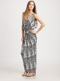 A vivid contrasting graphic print is twisted and elegantly gathered for a sexy, airy effect. V-neckSleevelessWide shoulder strapsCenter gathered bodice for added drapePlunging back with center self-tieHigh-low hemAbout 43 from natural waist94% venezia/6% spandexDry cleanMade in USAModel shown is 5'9½ (176cm) wearing US size Small. A vivid contrasting graphic print is twisted and elegantly gathered for a sexy, airy effect. V-neckSleevelessWide shoulder strapsCenter gathered bodice for added drapePlunging back with center self-tieHigh-low hemAbout 43 from natural waist94% venezia/6% spandexDry cleanMade in USAModel shown is 5'9½ (176cm) wearing US size Small.