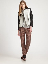 Edgy biker styling crafted from rich bouclé and topstitched leather panels.Snap-button stand collarAsymmetric front zipperZipper cuffsBack buckle tabsAbout 22 from shoulder to hemBody: 55% polyester/40% wool/5% other fibersLeather trimDry clean by a leather specialistImportedModel shown is 5'10 (177cm) wearing US size 4. Edgy biker styling crafted from rich bouclé and topstitched leather panels.Snap-button stand collarAsymmetric front zipperZipper cuffsBack buckle tabsAbout 22 from shoulder to hemBody: 55% polyester/40% wool/5% other fibersLeather trimDry clean by a leather specialistImportedModel shown is 5'10 (177cm) wearing US size 4.