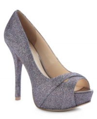 Colorblocked suede and crazy cute glitter. Top off your dressy evening with GUESS' Isila platform pumps for a look that's truly sensational. Colorblocked suede and crazy cute glitter. Top off your dressy evening with GUESS' Isila platform pumps for a look that's truly sensational.