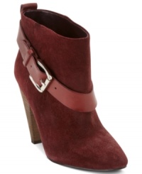 The perfect accessory. The way the buckled strap drapes around the ankle of GUESS' Carolyn booties makes it resemble a belt. So cute! The perfect accessory. The way the buckled strap drapes around the ankle of GUESS' Carolyn booties makes it resemble a belt. So cute!