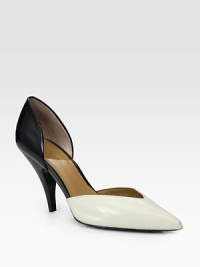Opposites attract in this two-tone cutout silhouette of smooth leather with an elegant point toe. Stacked heel, 3¾ (95mm)Leather upperPoint toeLeather lining and solePadded insoleImportedOUR FIT MODEL RECOMMENDS ordering one size up as this style runs small. 
