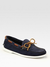 Iconic design rendered in rich, smooth suede with contrast stitching and lace-up detail.Suede upperLeather liningRubber soleMade in USA Iconic design rendered in rich, smooth suede with contrast stitching and lace-up detail.Suede upperLeather liningRubber soleMade in USA
