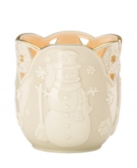 Carved snowflakes flurry around a cheerful snowman in smooth porcelain upon this Merry Lights Snowman votive holder from Lenox. A gold scalloped trim coordinates this home accent with any favorite Lenox fine dinnerware or giftware. Carved snowflakes flurry around a cheerful snowman in smooth porcelain upon this Merry Lights Snowman votive holder from Lenox. A gold scalloped trim coordinates this home accent with any favorite Lenox fine dinnerware or giftware.