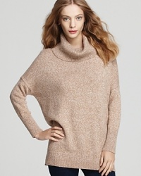 A classic fall staple, this camel-colored turtleneck is the quintessential layer for denim and cords this season. A classic fall staple, this camel-colored turtleneck is the quintessential layer for denim and cords this season.