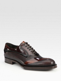 Leather lace-up style with 3D applique detail and exaggerated sole.Leather upperLeather liningLeather soleMade in Italy Leather lace-up style with 3D applique detail and exaggerated sole.Leather upperLeather liningLeather soleMade in Italy