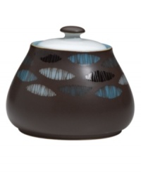 A handsome addition to casual dining, the Sienna covered sugar bowl features a glazed white lid and matte mocha body with shimmering blue ellipses. A handsome addition to casual dining, the Sienna covered sugar bowl features a glazed white lid and matte mocha body with shimmering blue ellipses.