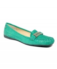 Take to the open roads with these Ria driving mocs by Calvin Klein. With classic moc and penny loafer detail, they're perfect for whatever bumps in the road come along during your day. Take to the open roads with these Ria driving mocs by Calvin Klein. With classic moc and penny loafer detail, they're perfect for whatever bumps in the road come along during your day.
