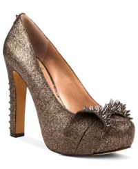 Danger: may cause jealousy. The Jamma platform pumps by Vince Camuto take fierce fashion to the next level with the addition of pointed metal studs at the bow accent and sky-high heel. Danger: may cause jealousy. The Jamma platform pumps by Vince Camuto take fierce fashion to the next level with the addition of pointed metal studs at the bow accent and sky-high heel.