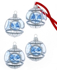 Miracle of lights: four exquisite drop ornaments feature silver glitter detailing and reflective panels to produce a festive, dazzling result. A stunning holiday set from Kurt Adler. Miracle of lights: four exquisite drop ornaments feature silver glitter detailing and reflective panels to produce a festive, dazzling result. A stunning holiday set from Kurt Adler.