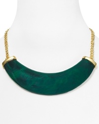 A bold polished resin horn punctuates this Kenneth Jay Lane necklace, which lends a fashion-forward feel to a simply styled 22-karat gold plated chain. A bold polished resin horn punctuates this Kenneth Jay Lane necklace, which lends a fashion-forward feel to a simply styled 22-karat gold plated chain.