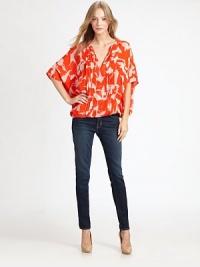 Decidedly chic top of pure silk in an eye-catching print with front pleats, three-quarter dolman sleeves and an elastic back hem. V-neckFront pleatsThree-quarter dolman sleevesElasticized back hemSilkDry cleanImportedModel shown is 5'10 (177cm) wearing US size Small. Decidedly chic top of pure silk in an eye-catching print with front pleats, three-quarter dolman sleeves and an elastic back hem. V-neckFront pleatsThree-quarter dolman sleevesElasticized back hemSilkDry cleanImportedModel shown is 5'10 (177cm) wearing US size Small.
