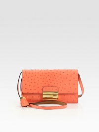 A petite design in luxurious ostrich stamped leather with radiant hardware.Detachable shoulder strap, 21½ dropPush-lock flap closureOne outside open pocketOne inside open pocketMetallic leather lining9½W X 6H X 1DImported A petite design in luxurious ostrich stamped leather with radiant hardware.Detachable shoulder strap, 21½ dropPush-lock flap closureOne outside open pocketOne inside open pocketMetallic leather lining9½W X 6H X 1DImported