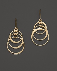 Interlocking hoops of 14K. yellow gold form a striking pattern. Interlocking hoops of 14K. yellow gold form a striking pattern.