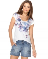 Metallic shine combined with an airbrush-inspired print creates an effortlessly cool effect on Calvin Klein Jeans' scoopneck tee. Metallic shine combined with an airbrush-inspired print creates an effortlessly cool effect on Calvin Klein Jeans' scoopneck tee.