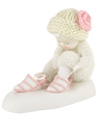 While no one is looking, this adorable baby plays dress-up. Crafted of porcelain bisque from Department 56. While no one is looking, this adorable baby plays dress-up. Crafted of porcelain bisque from Department 56.