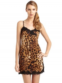 THE LOOKSpirited leopard printAdjustable textured spaghetti strapsLace trimmed neckline and hemSide slits at hemTHE FITAbout 28 from shoulder to hemTHE MATERIALBody: polyesterTrim: 80% nylon/20% spandexCARE & ORIGINMachine washImportedModel shown is 5'11 (180cm) wearing US size Small. THE LOOKSpirited leopard printAdjustable textured spaghetti strapsLace trimmed neckline and hemSide slits at hemTHE FITAbout 28 from shoulder to hemTHE MATERIALBody: polyesterTrim: 80% nylon/20% spandexCARE & ORIGINMachine washImportedModel shown is 5'11 (180cm) wearing US size Small.
