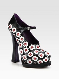 A flower appliqué adorns this leather platform Mary Jane style with an adjustable ankle strap. Self-covered heel, 5½ (140mm)Covered platform, 1¾ (45mm)Compares to a 3¾ heel (95mm)Leather upperAdjustable ankle strapLeather liningLeather and rubber solePadded insoleMade in ItalyThis style runs small. We recommend ordering one half size up for a standard fit. A flower appliqué adorns this leather platform Mary Jane style with an adjustable ankle strap. Self-covered heel, 5½ (140mm)Covered platform, 1¾ (45mm)Compares to a 3¾ heel (95mm)Leather upperAdjustable ankle strapLeather liningLeather and rubber solePadded insoleMade in ItalyThis style runs small. We recommend ordering one half size up for a standard fit.