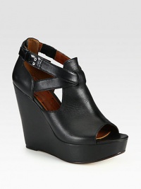 Timeless strappy wedge sandal crafted of ultra-smooth leather. Self-covered wedge, 4¾ (120mm)Covered platform, 1¾ (45mm)Compares to a 3 heel (75mm)Leather upperAdjustable ankle strap with pull-tabsLeather lining and solePadded insoleImported Timeless strappy wedge sandal crafted of ultra-smooth leather. Self-covered wedge, 4¾ (120mm)Covered platform, 1¾ (45mm)Compares to a 3 heel (75mm)Leather upperAdjustable ankle strap with pull-tabsLeather lining and solePadded insoleImported