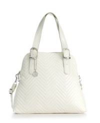 A refined dome shape and unique quilted chevron pattern make this knockout style one that will stand out in a crowd. Shiny silvertone hardware an an optional crossbody strap add versatility to this chic design. A refined dome shape and unique quilted chevron pattern make this knockout style one that will stand out in a crowd. Shiny silvertone hardware an an optional crossbody strap add versatility to this chic design.
