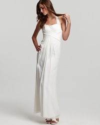 Intricately detailed in wispy chiffon, this Jill Stuart Dress halter gown flaunts a barely-there back for a head-turning statement. Intricately detailed in wispy chiffon, this Jill Stuart Dress halter gown flaunts a barely-there back for a head-turning statement.