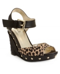 The best of espadrilles and mules meet up on the Tabari2 sandals by GUESS. With bold nail head trim and an espadrille style heel, these wedges are perfect for transitional seasons. The best of espadrilles and mules meet up on the Tabari2 sandals by GUESS. With bold nail head trim and an espadrille style heel, these wedges are perfect for transitional seasons.