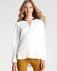 Boasting a contrast collar and back panel for a graphic punch, this Sanctuary top is just as chic in the office as it is on the weekend. Boasting a contrast collar and back panel for a graphic punch, this Sanctuary top is just as chic in the office as it is on the weekend.