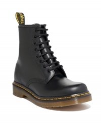 This pair of men's boots is pure Dr. Martens--funky modern boots for men crafted in quality leather, with their signature yellow topstitching and logo tag at heel. Imported. This pair of men's boots is pure Dr. Martens--funky modern boots for men crafted in quality leather, with their signature yellow topstitching and logo tag at heel. Imported.